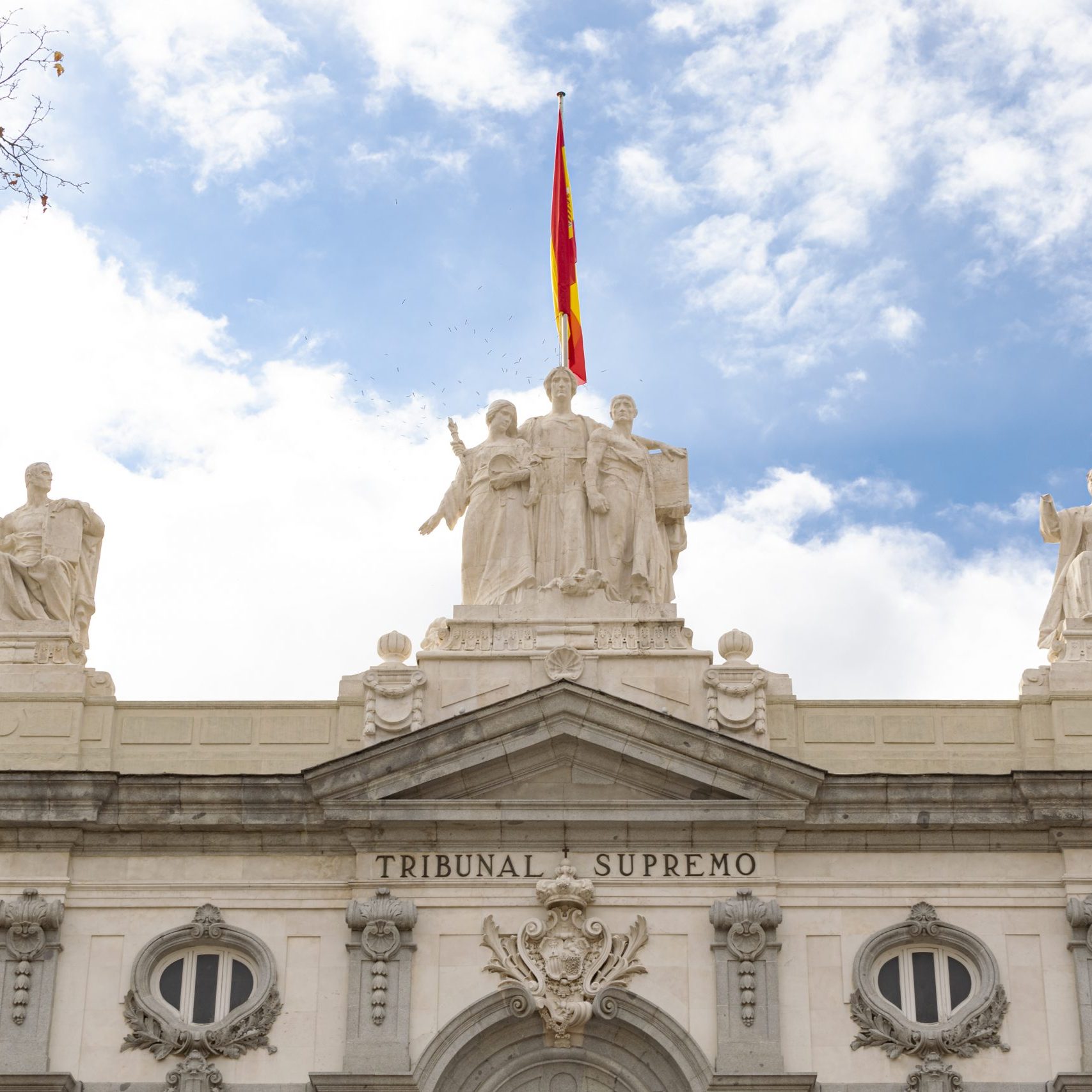 Madrid, Spain - December 19, 2021:  Detail of the main facade of the Supreme Court building in Madrid, Spain.
